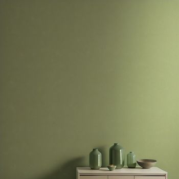 white dresser with two green vases on top of it next to a green wall with a bowl on top