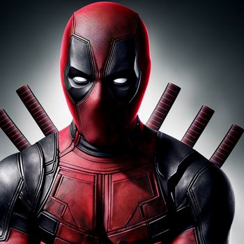 deadpool character with two swords in his hands and a red mask on his face and chest