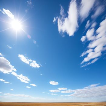 field with a blue sky and some clouds in the background and a sun shining over the horizon with a few clouds