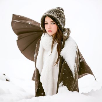 woman in a dragon costume in the snow with a scarf around her neck and a hood on her head