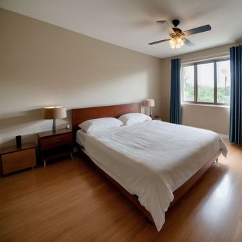 bedroom with a bed, nightstands, and a ceiling fan